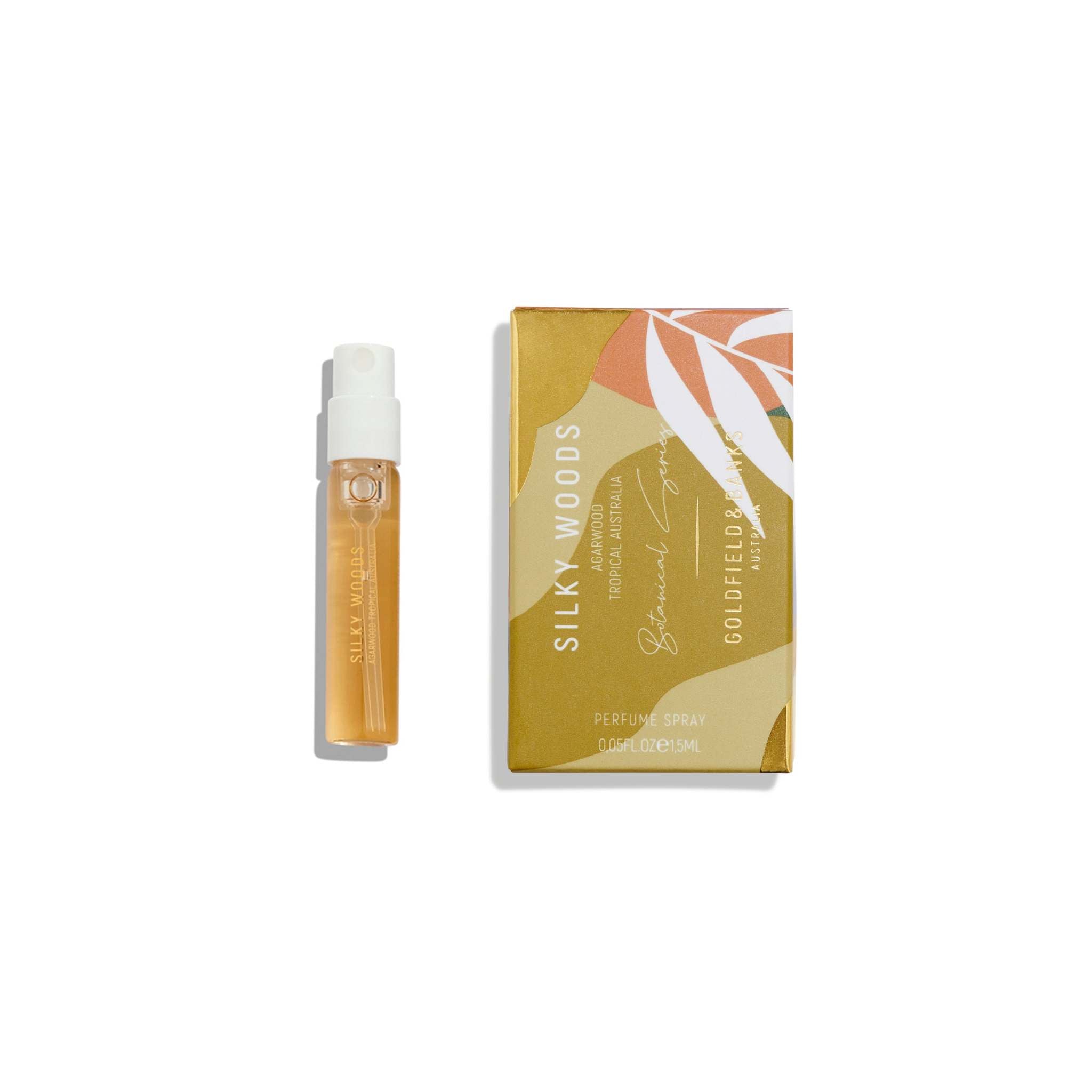 Silky Woods 2ml free sample perfume spray with gold and peach packaging displayed on white background